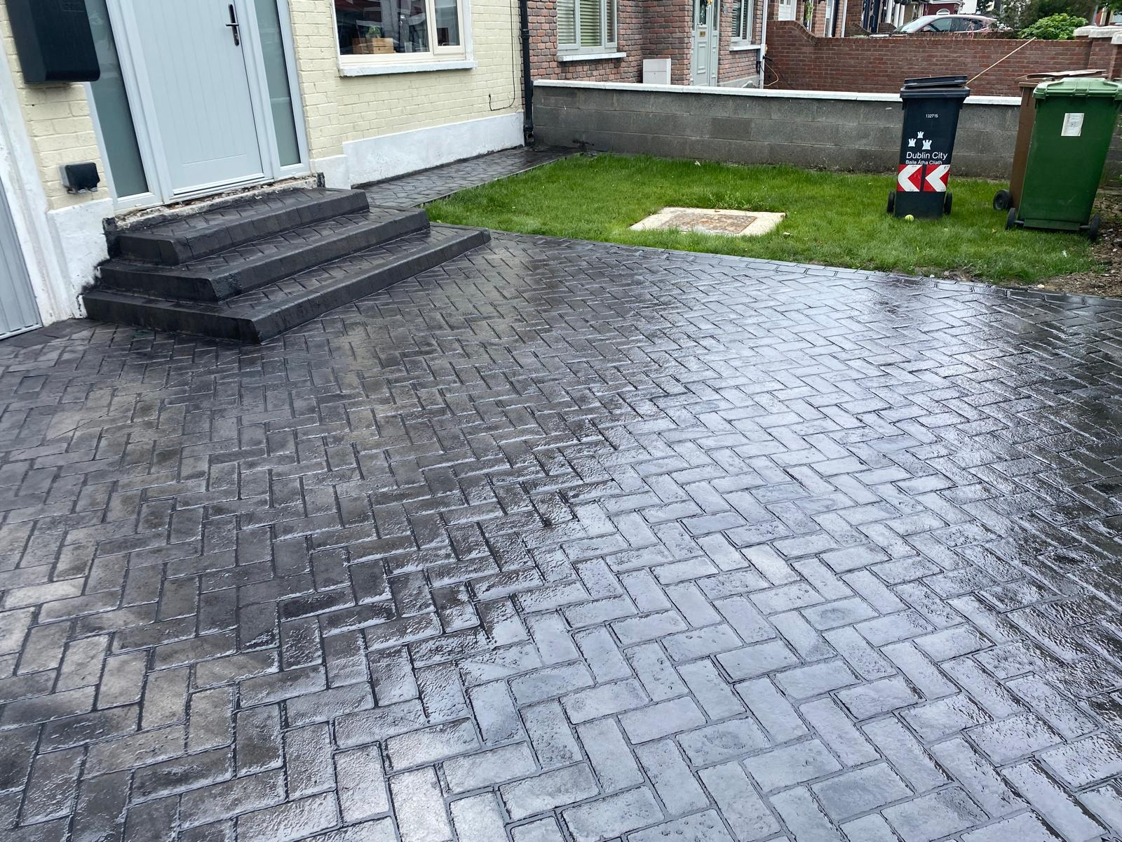 Decorative concrete driveway showcasing a brick texture by Concrete Driveways Dublin